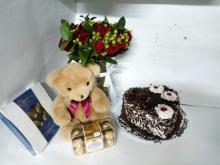 12 red roses vase teddy bear ferrero box of chocolates and 2 kg heart shaped cake 12 red roses vase teddy bear ferrero box of chocolates and 2 kg heart shaped cake
